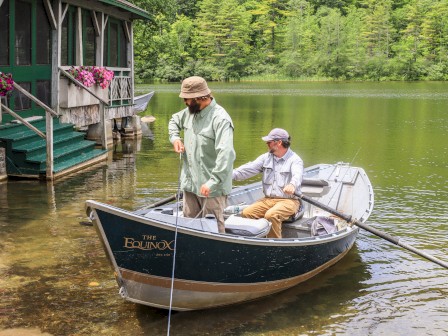 Two people in a boat named 